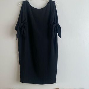 Black dress with lining and ties on the sleeves size 8